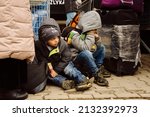Small photo of Korczowa, Poland 5.03.2022 - children of a refugee from Ukraine at the border crossing in Korczowa