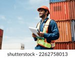 A worker working at container , Man worker managing the import and export container.