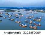 Small photo of Hundreds of vessels are seen anchored in Karnafuli river near port in Chattogram. The Port of Chittagong is the busiest seaport on the coastline of the Bay of Bengal.