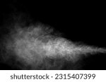 Close-up of steam or abstract white smoke rising above. from humidifier spray isolated on a black background