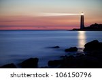 Seascape At Sunset. Lighthouse...
