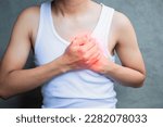 Small photo of People with chest pain isolated, young man with tachycardia, Guy with heart pain isolated background, young man with heart pain. Concept of people with heart problems
