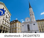 Small photo of Vienna, Austria. August 29, 2013. St. Michael's Church. The building dates back to the late Romanesque period. The church is the first place where Mozart's "Requiem" was performed. Facade. Bell Tower.