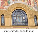 Small photo of Stanford, California, USA. November 6, 2011. Leland Stanford Junior University, founded in 1885. Memorial Church. Designed by architect Charles A. Coolidge. Facade. Detail. Stained glass windows.