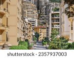 Street view with tall townhouses and buildings. Monaco street.