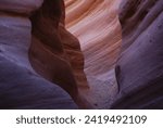 Little Wild Horse Canyon cuts through millions of years of geologic history in a series of narrow passages, or slot canyons, in South Central Utah.