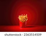 Small photo of A very tasty pack of french fries, with a large red background, with lot of negative space for adding text or captions