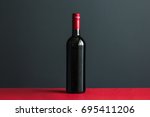 Bottle Of Wine On Red Table