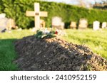 Shallow focus of a fresh burial ...