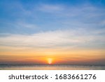 Sunset Sky over sea in the Morning with colorful Sunrise Cloudy, Horizon sky background .