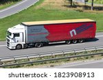 Small photo of ENGELSKIRCHEN, GERMANY - JUNE 24, 2020: MAN TGX truck with Nico Mooij curtainside trailer on motorway.