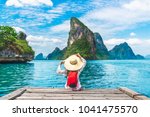 Traveler woman joy relaxing on wood bridge in beautiful destination island, Phang-Nga bay, Adventure lifestyle travel Thailand, Tourism nature landscape Asia, Tourist on summer holiday vacation trips