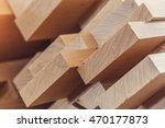 Wood timber construction material for background and texture. close up. Stack of wooden bars. small depth of field
