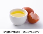 Egg whites in  glass cup on  white background.