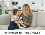 little girl playing with au pair girl