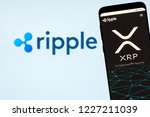 Small photo of KYRENIA, CYPRUS - NOVEMBER 8, 2018: Ripple ( XRP ) website on the smartphone display. Ripple is cryptocurrency and remittance network.