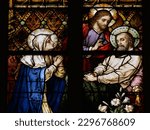 Small photo of Covington, KY, US, 2019.05.31, Stained glass window. Jesus and Our Lady at the deathbed of saint Joseph.