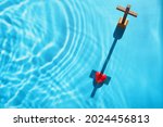 Small photo of Red heart in Christian cross shadow on blue background. Concept Jesus loves you, Jesus crucify himself on cross with love. Forgiving sin , God's love, Easter time , Faith God. Christianity background.