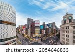 Small photo of tokyo, japan - july 05 2021: Large panoramic bird's-eye view of the Ginza 4-Chome scramble crossing at the junction of Chuo and Harumi streets with the iconic clock tower of the Ginza Wako building.