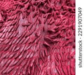 Small photo of The red coarse fiber was woven into a rough, sturdy fabric that was perfect for making work clothes that could withstand the toughest conditions.