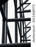 Small photo of abstract photo of iron poles, construction, initial framework, initial stages