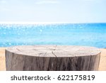 Stump Table On Sandy Beach With ...