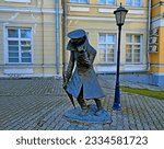 Small photo of Taganrog Rostov region, Russia - 10.30.2021. Genre sculpture Man in a case based on Chekhov's short story