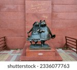 Small photo of Krasnodar, Krasnodar Krai, Russia - 10.31.2021. Genre sculpture Walking Dogs