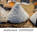 Small photo of French cheese cone shaped port aubry on farmer market