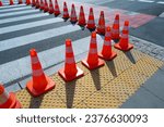 Small photo of Road Works Cone, Construction Cone, Red Plastic Warning Sign, Road Witches' Hat, Channelizing Cone on Street, Safety Traffic, Many Road Cones on a Pedestrian Crossing