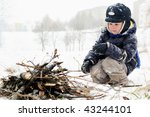 Little Boy Playing At Snowy...