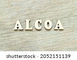 Small photo of Alphabet letter in word ALCOA (Abbreviation of Attributable, Legible, Contemporaneous, Original and Accurate) on wood background