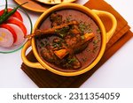 Small photo of Indian style Mutton OR Gosht Masala OR indian lamb meat rogan josh served with Naan