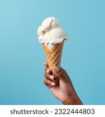 Ice cream cone on a blue...
