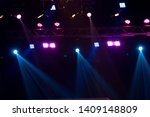 Performance moving lighting on construction light beam ray downward in yellow blue color, on Concert and Fashion Show stage ramp. LED par new technology to save power more color and high density Light