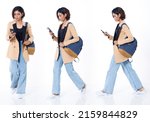 Small photo of Collage Full length of Asian Indian 20s working woman with curl hair hold cell smart phone, backpack, blazzer and jean pants. Female walk forward side and work internet over white background isolated