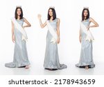 Full length of Miss Beauty Pageant Contest wear blue gray evening sequin gown with diamond crown sash, Asian female stand express feeling happy smile over white background isolated
