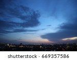dark blue cloud with white light sun set sky background and city light midnight evening time  