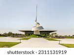 Small photo of Sharjah, United Arab Emirates, March 17, 2023 : The Scroll Monument - Sharjah World Book Capital Monument 2019 and the House of Wisdom in Sharjah city, United Arab Emirates