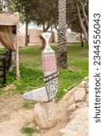 Small photo of Abu Dhabi, United Arab Emirates, March 19, 2023 : Museum symbol stands in the courtyard of the Heritable village Abu Dhabi museum in Abu Dhabi city, United Arab Emirates