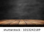 Wooden table with dark blurred...