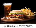 Small photo of The Hamburger Potato combo is a staple in fast food and American cuisine. It begins with a hearty hamburger, boasting a well-seasoned ground meat patty embraced by lightly toasted buns.