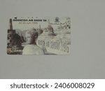 Small photo of West Java, Indonesia, Asia, 28 December 2023; Magnetic public telephone card around the 1990s, PT. Telkom Indonesia picture of Borobudur, Indonesia air show'96, 22-30 June 1996