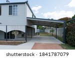 Small photo of Fully renovated high set Queenslander style house with new carport