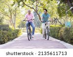 Happy Senior Man Riding Bicycle ...