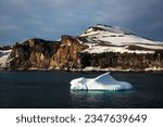 Small photo of The climb up, view of rock; Deception Island, South Shetlands; Rock pillar, at the entrance, to Bellows; Deception Bay, Blue Island, South Shetlands; Iceberg at the entrance, Bellows water