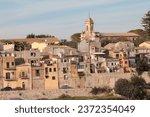 Small photo of ragusa sicily italy town medium shot church buildings homes houses on hill unlevel uneven ground