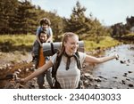 Young family hiking in the...