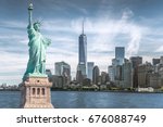 The statue of Liberty with World Trade Center background, Landmarks of New York City