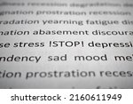 Small photo of Mental health, stop depression, psychological problems concept. Printed text stress, depression, sad mood, prostration, abasement on white paper close-up. Selective focus on word Stop, low angle view.